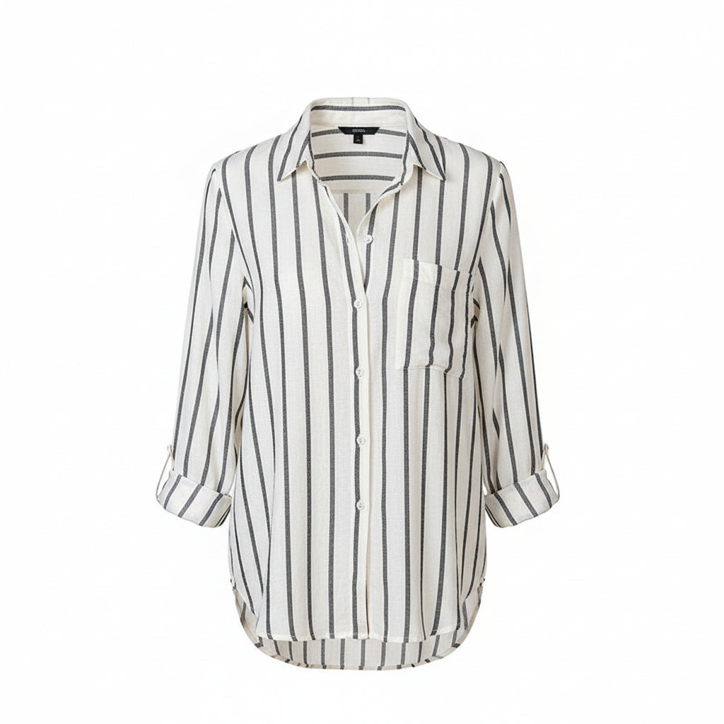 Woman wearing a striped shirt and jeans on a white background