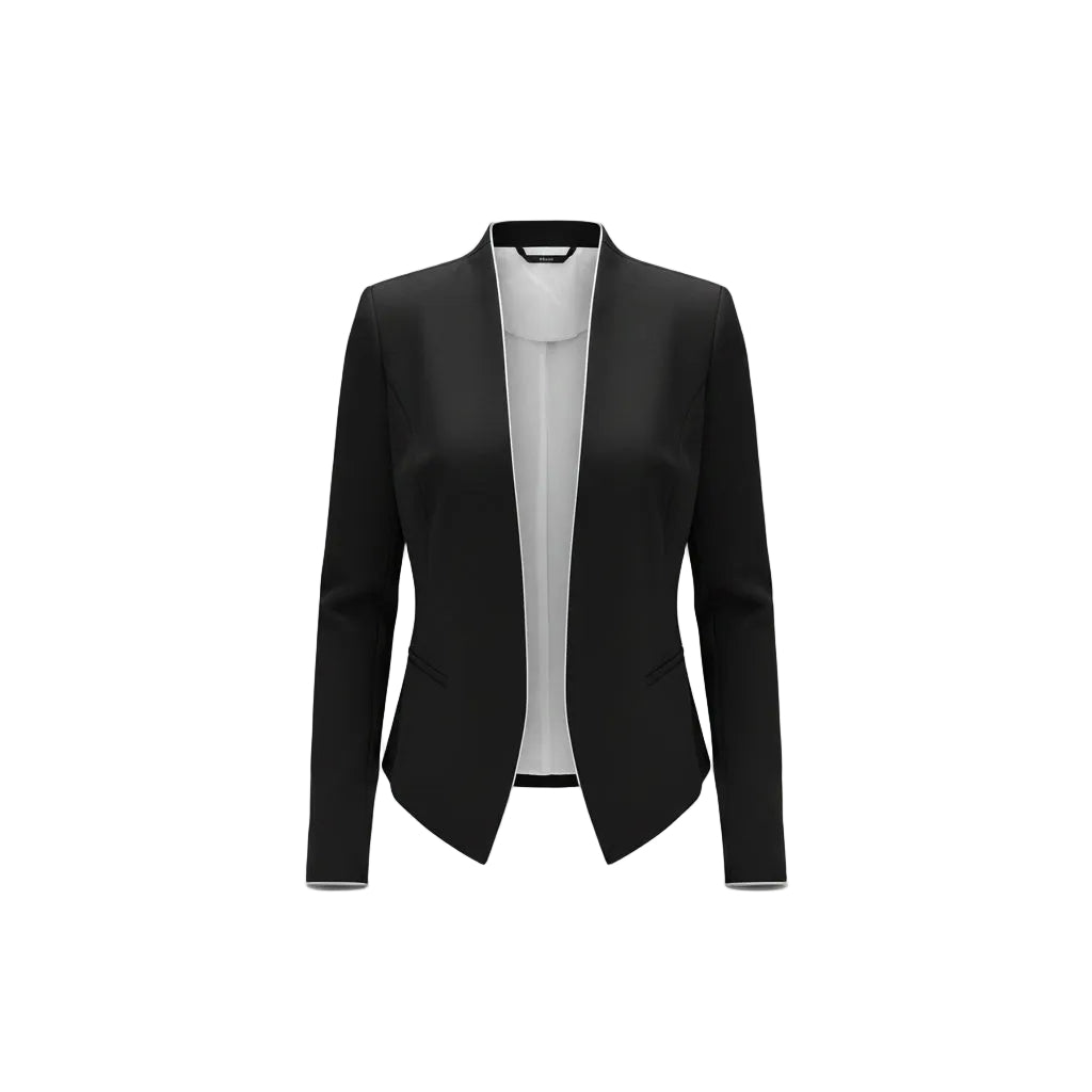 Woman taking a mirror selfie wearing a black blazer and white top.