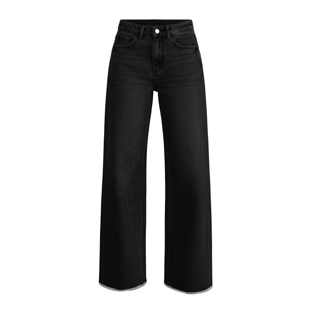 Person wearing black wide-leg jeans on a plain background