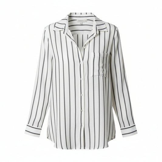 Woman wearing a striped shirt and jeans on a white background