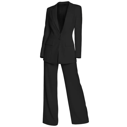 Black suit worn by a model against a white draped curtain background