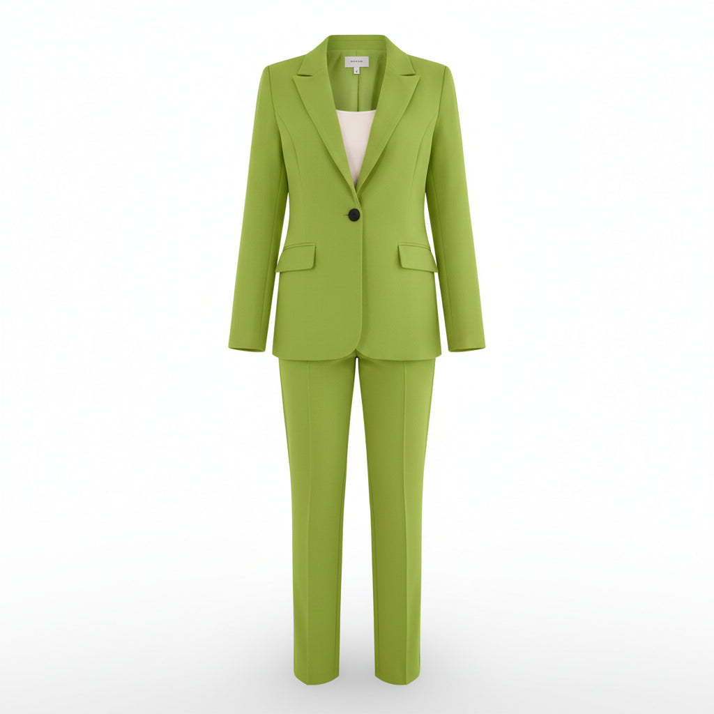 Person wearing a green suit with a white top on a white background