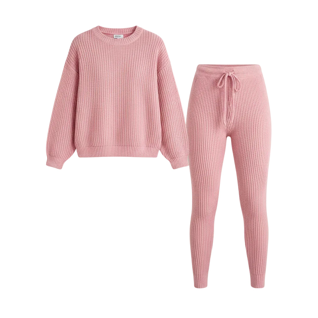 Person wearing a pink ribbed lounge set in a living room.