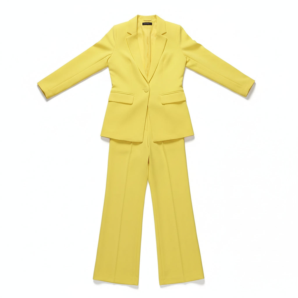 Person wearing a bright yellow suit against a plain background