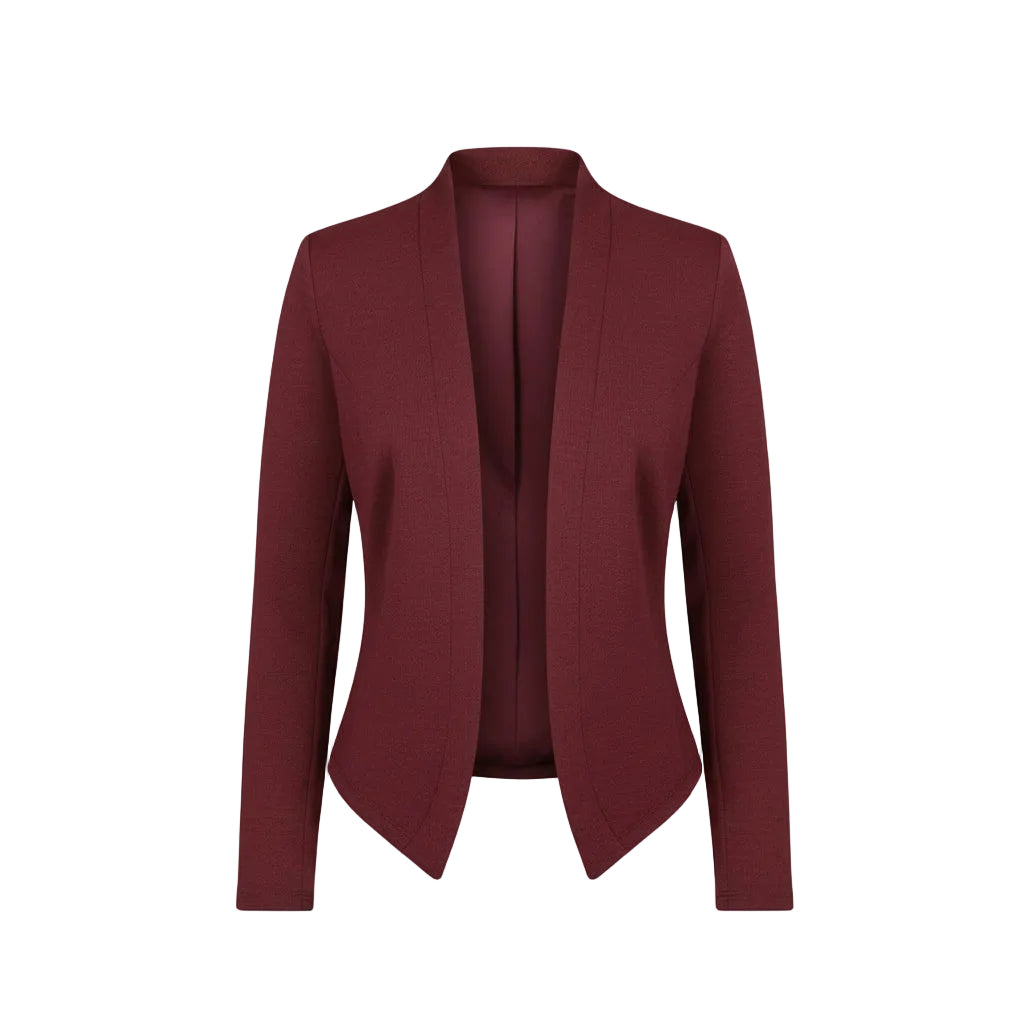 Woman taking a selfie wearing a red blazer over a white top and blue pants.