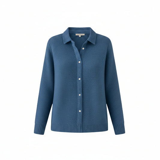 Blue button-up sweater worn by a person on a white background