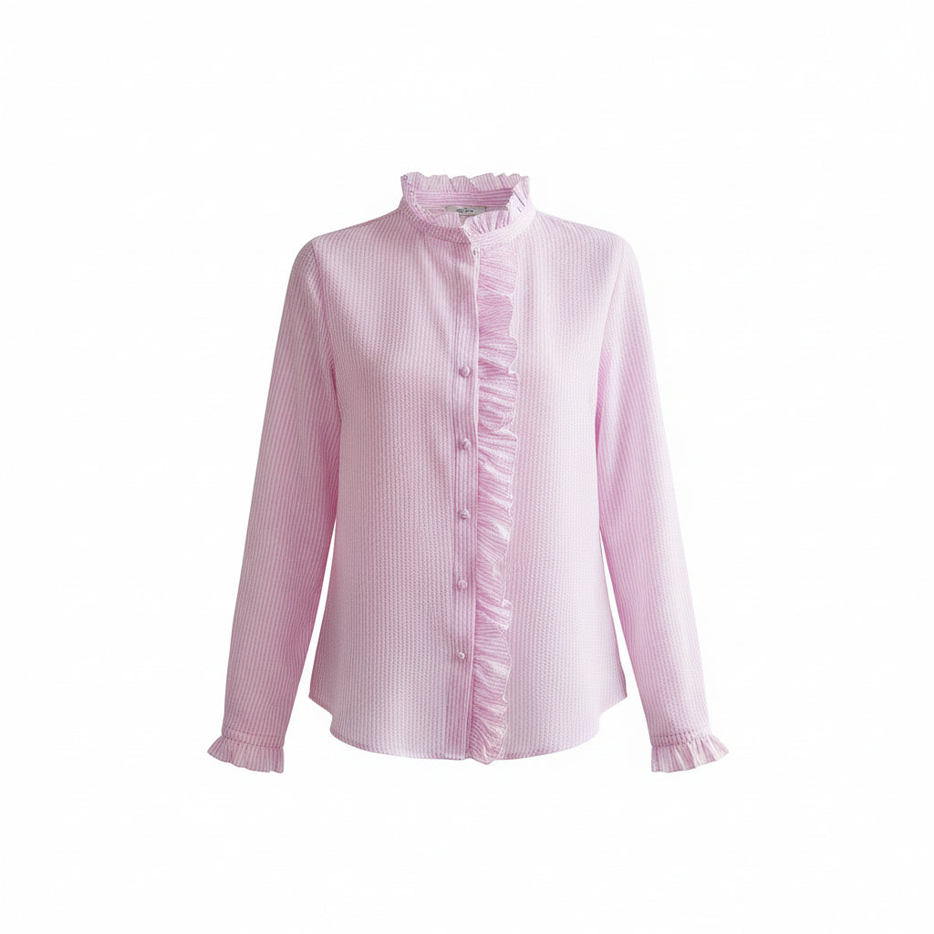 Woman wearing a pink striped shirt in a living room setting